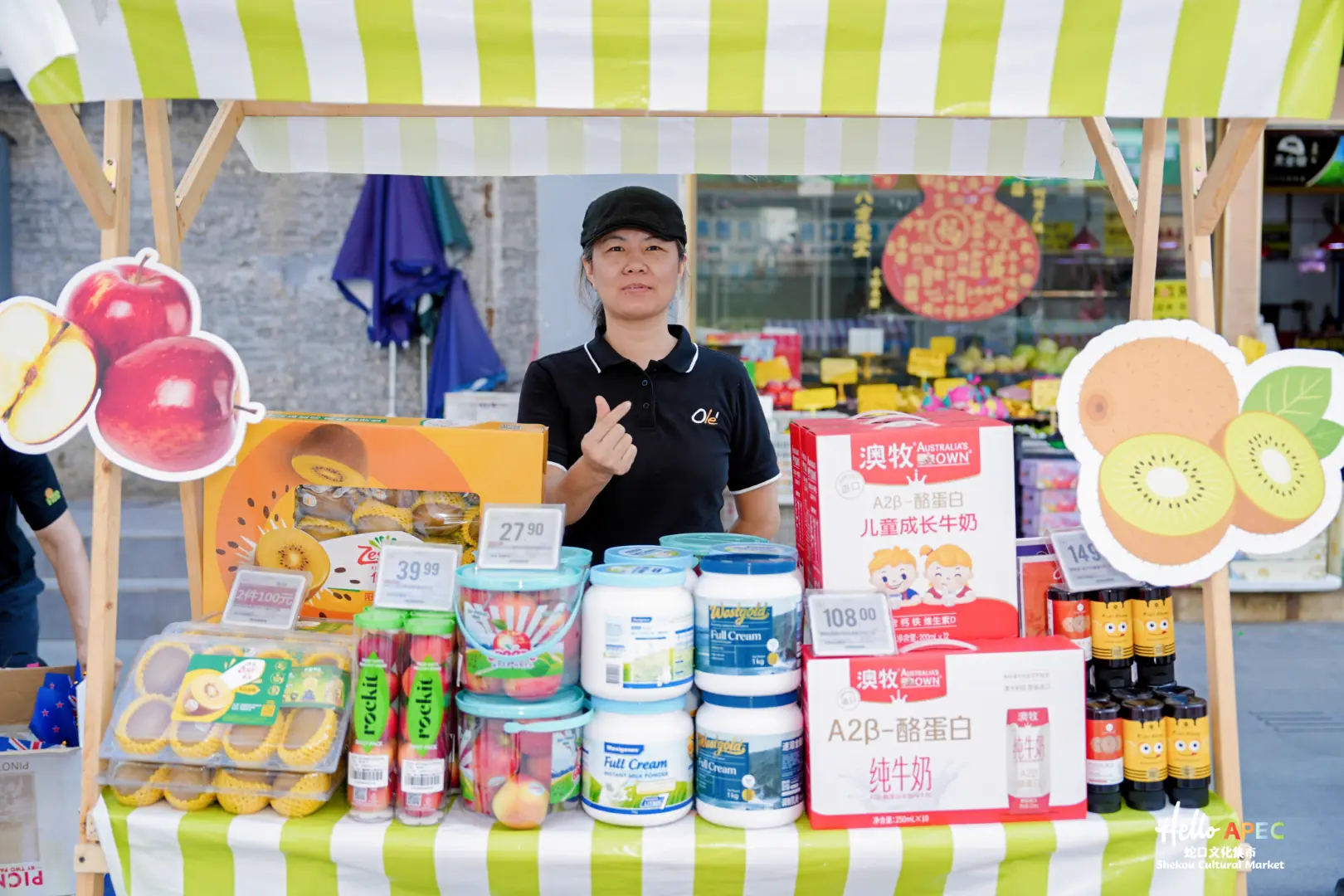 Fruit, dairy products and honey displayed at a market stall