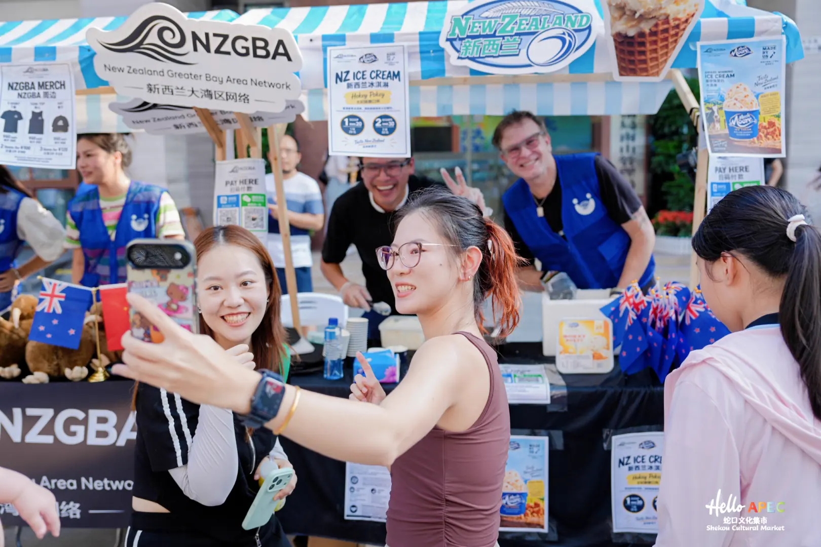 Visitors taking a selfie in front of the NZGBA ice cream stall